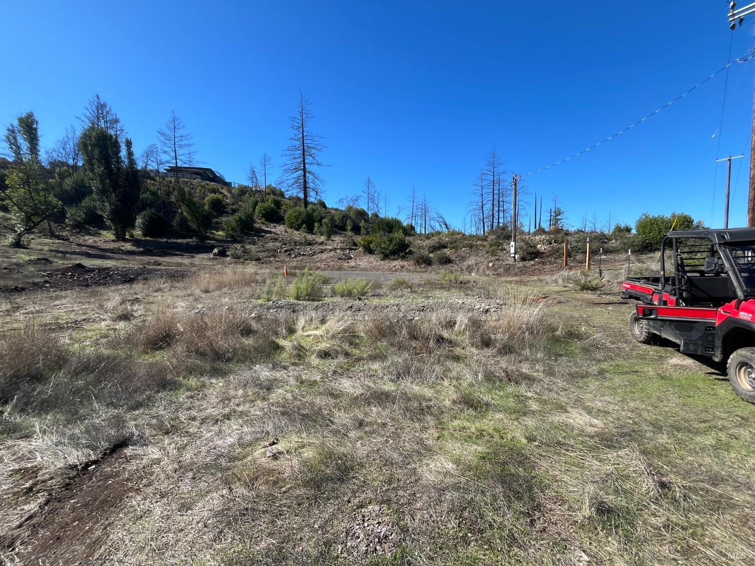 1580 Los Alamos Road Santa Rosa, CA 95404 - Photo 4 of 13 a view of a parking space and a yard