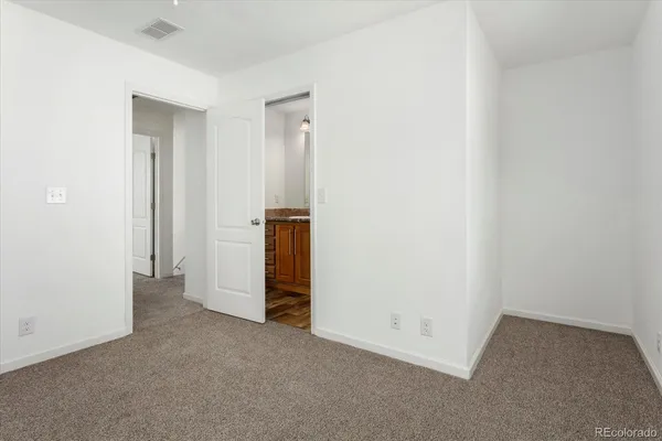 an aerial view of residential houses with wooden floor