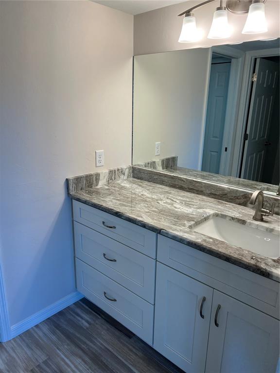 175 Kings Highway, Unit 1018 Punta Gorda, FL 33983 - Photo 15 of 35 a bathroom with a granite countertop sink and mirror