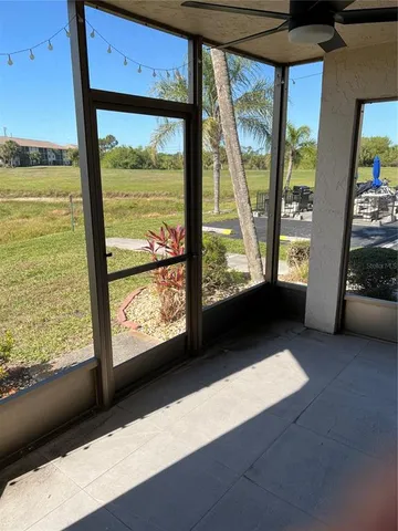a view of a house with backyard porch and entertaining space