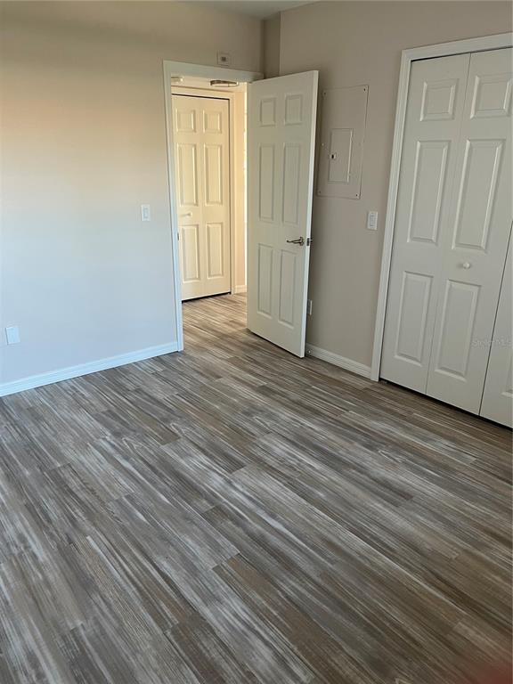 175 Kings Highway, Unit 1018 Punta Gorda, FL 33983 - Photo 24 of 35 a view of a livingroom with wooden floor
