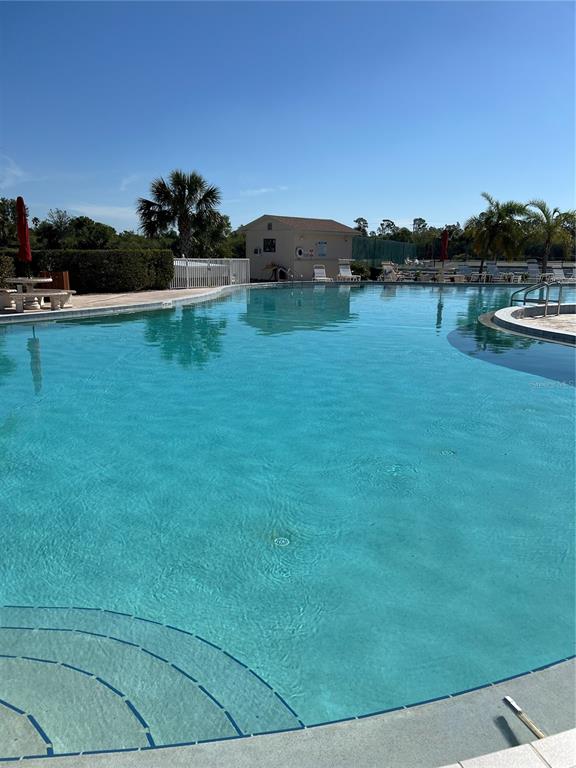 175 Kings Highway, Unit 1018 Punta Gorda, FL 33983 - Photo 31 of 35 a view of a lake with houses in the back