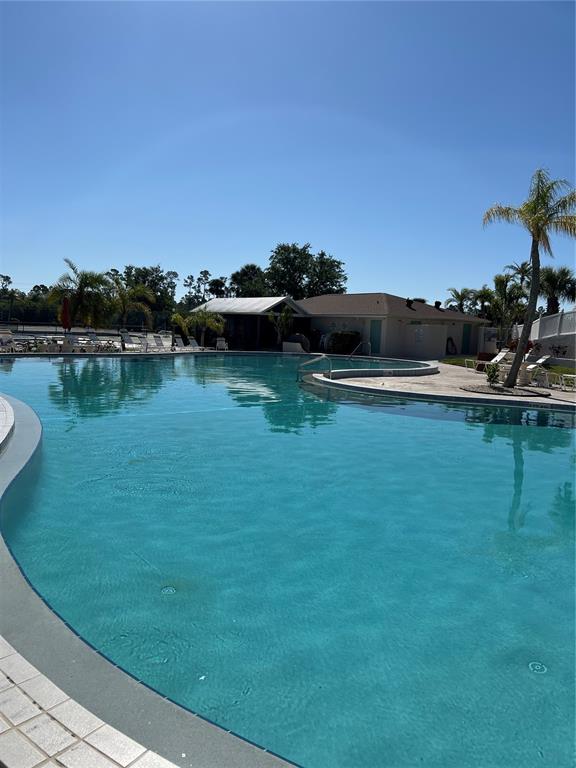 175 Kings Highway, Unit 1018 Punta Gorda, FL 33983 - Photo 33 of 35 a view of a lake with houses