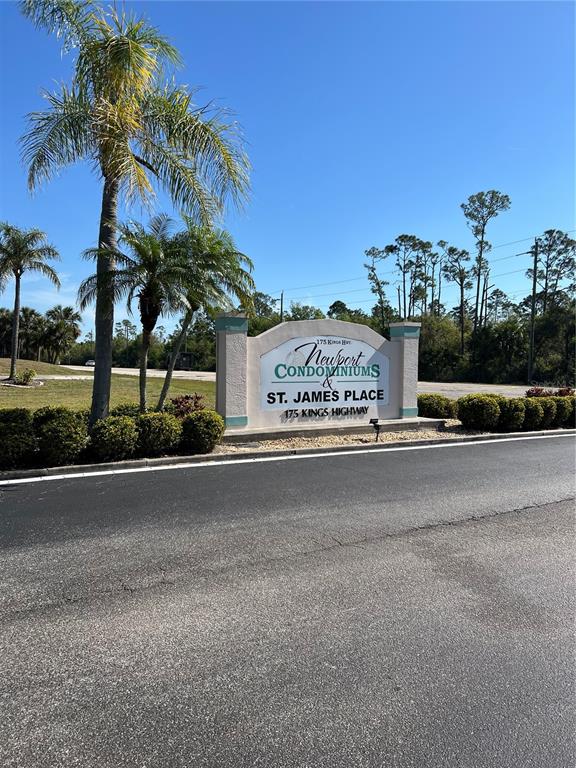 175 Kings Highway, Unit 1018 Punta Gorda, FL 33983 - Photo 4 of 35 a sign on a side of a road