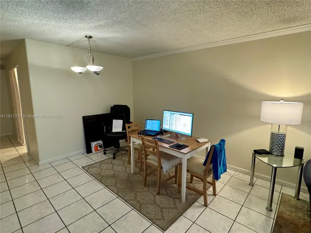 a bedroom with a bed and a view of bathroom