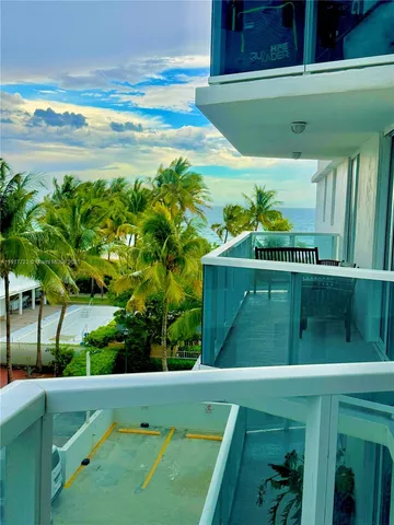 a kitchen with a refrigerator and countertop
