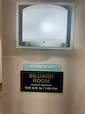 a living room with lots of furniture and white walls