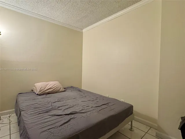 a living room with furniture a ceiling fan and a rug