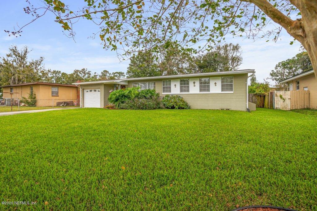 6617 Aires Road Jacksonville, FL 32244 - Photo 3 of 37 a view of a house with a yard and a porch