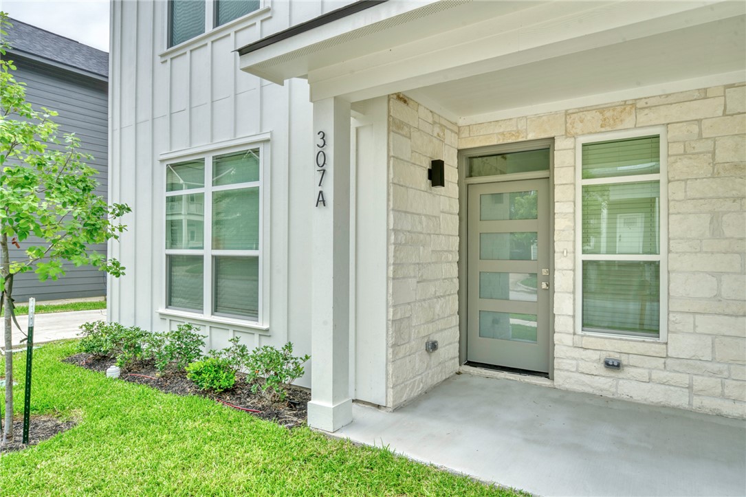 307 Cooner Street, Unit A College Station, TX 77840 - Photo 2 of 35 front view of a house with a yard