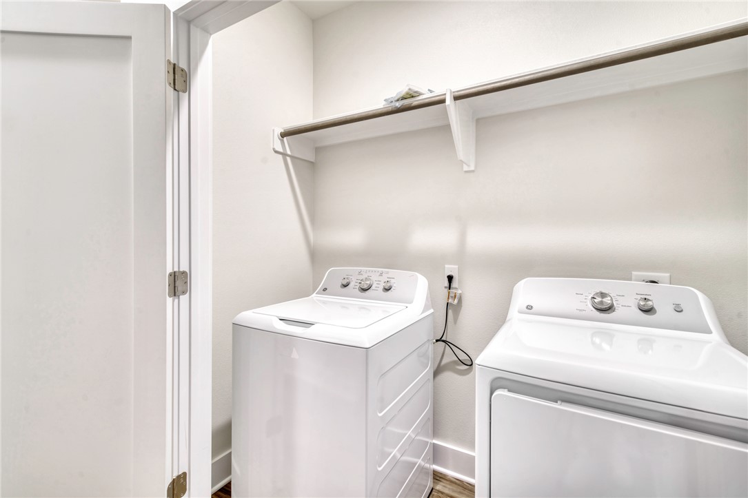 307 Cooner Street, Unit A College Station, TX 77840 - Photo 33 of 35 a utility room with dryer and washer