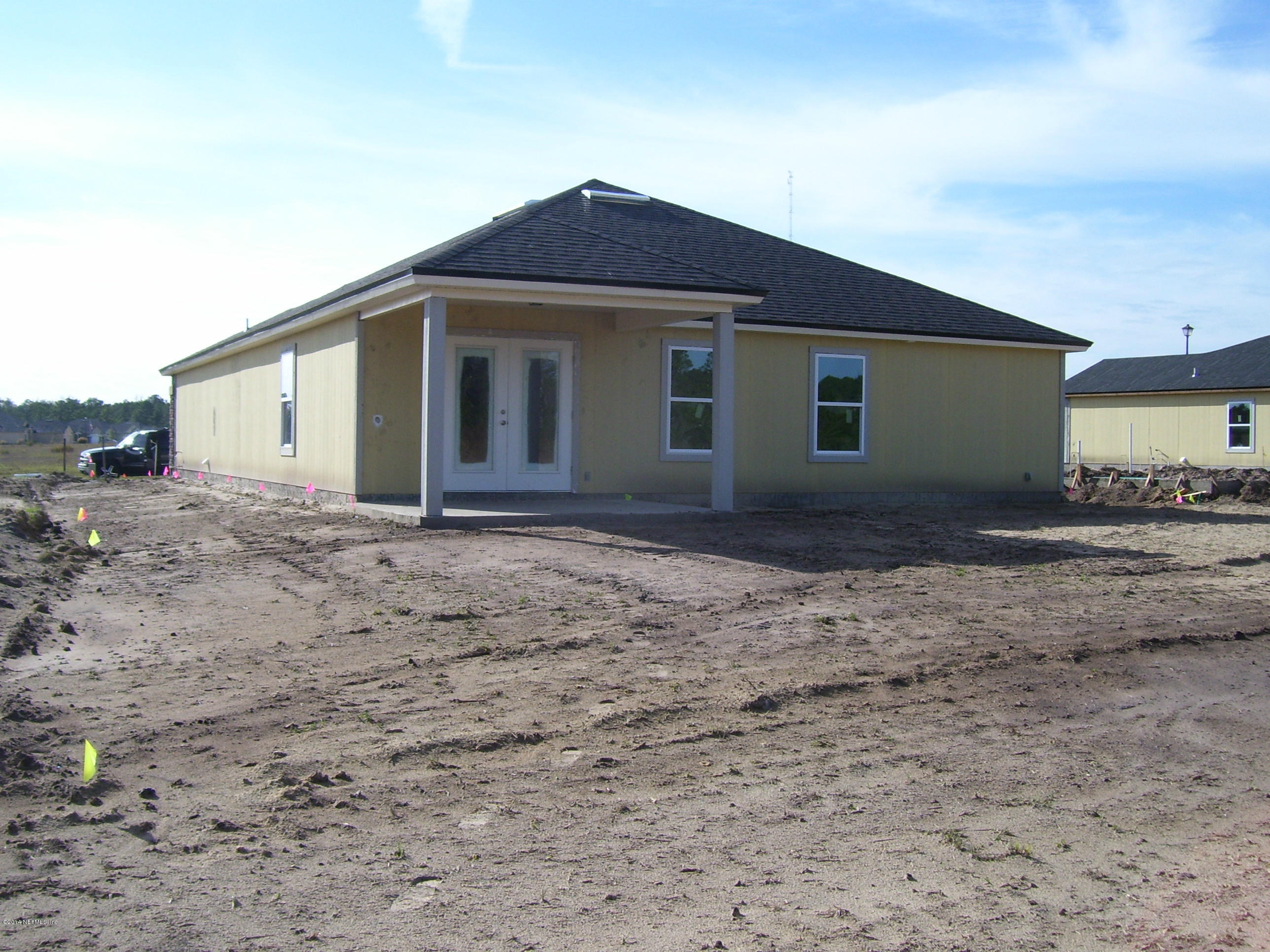 3880 Great Falls Loop Middleburg, FL 32068 - Photo 14 of 32 a front view of a house with a yard