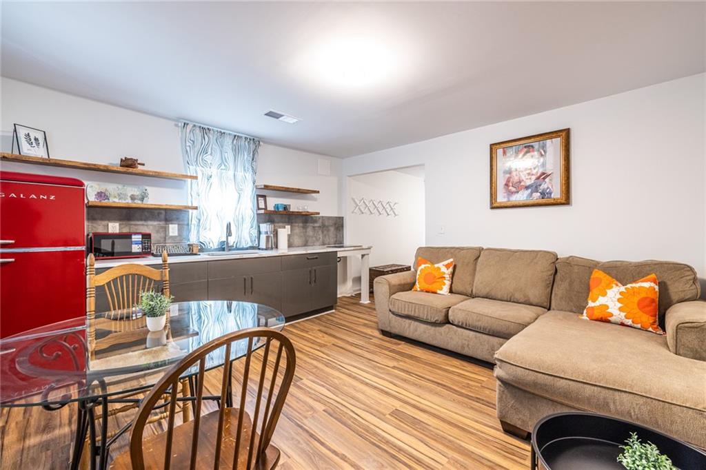 4350 Welcome All, Unit 1 Atlanta, GA 30349 - Photo 5 of 22 a living room with furniture and a couch