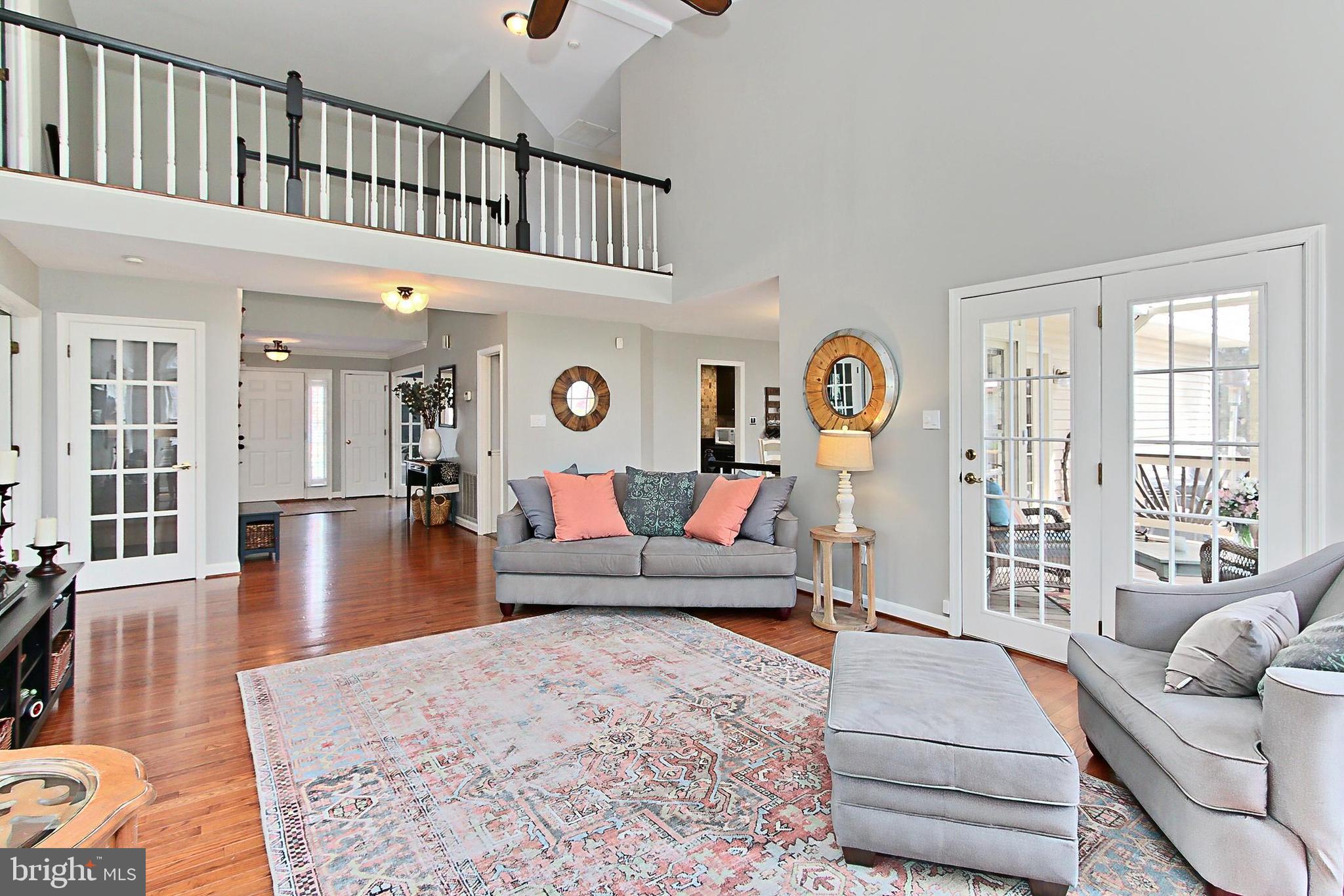 6306 Lee Forest Path Centreville, VA 20120 - Photo 15 of 49 a living room with furniture and wooden floor