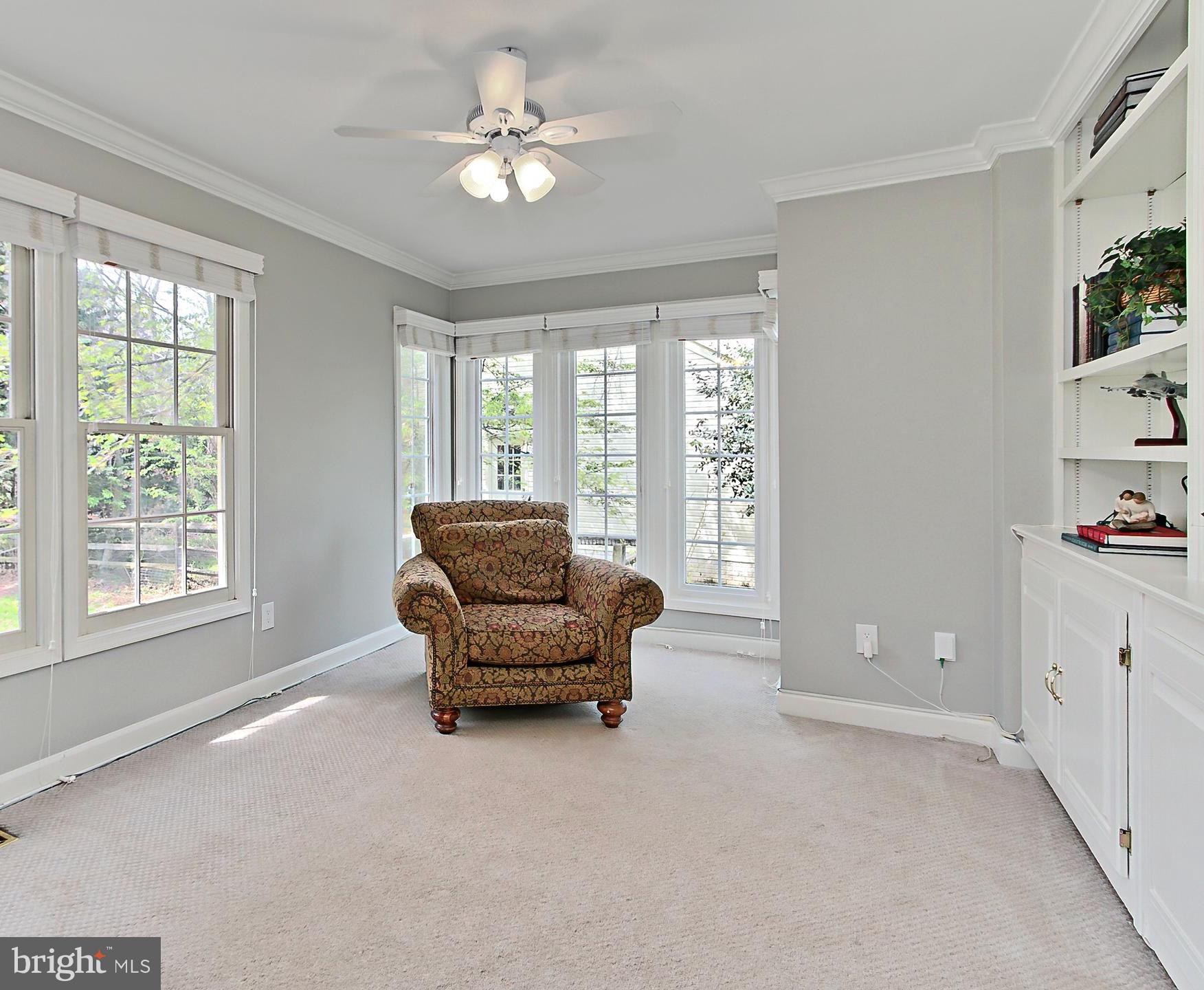 6306 Lee Forest Path Centreville, VA 20120 - Photo 16 of 49 a living room with furniture and a window