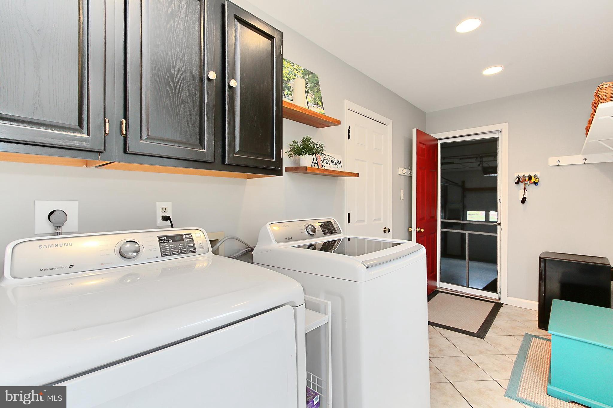 6306 Lee Forest Path Centreville, VA 20120 - Photo 19 of 49 a utility room with dryer and washer