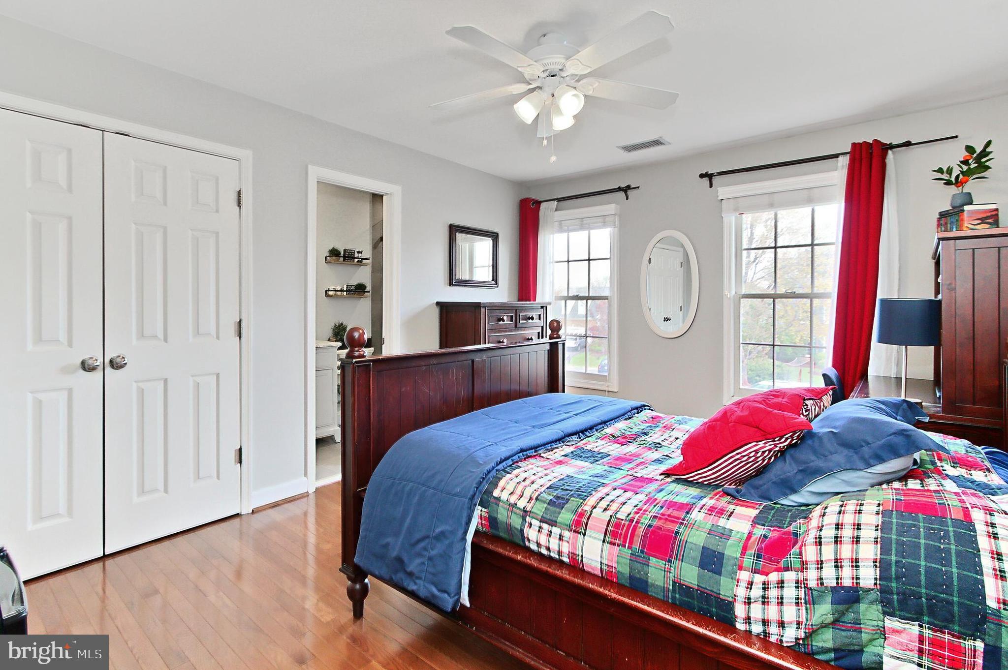6306 Lee Forest Path Centreville, VA 20120 - Photo 26 of 49 a bedroom with a bed dresser and a window