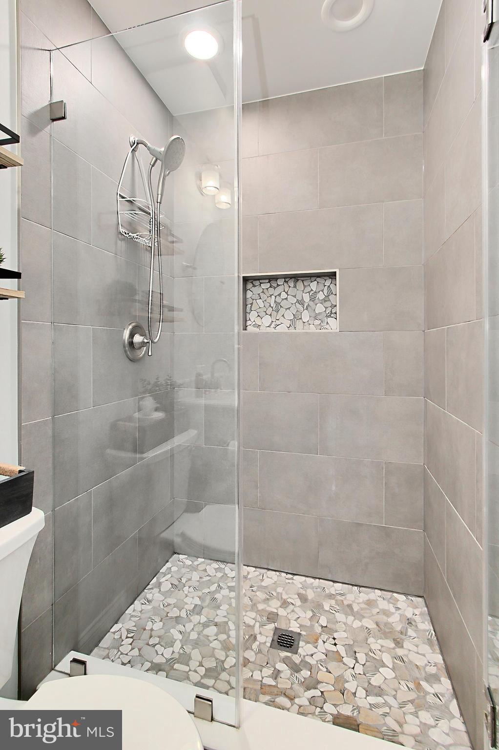 6306 Lee Forest Path Centreville, VA 20120 - Photo 28 of 49 a bathroom with a shower