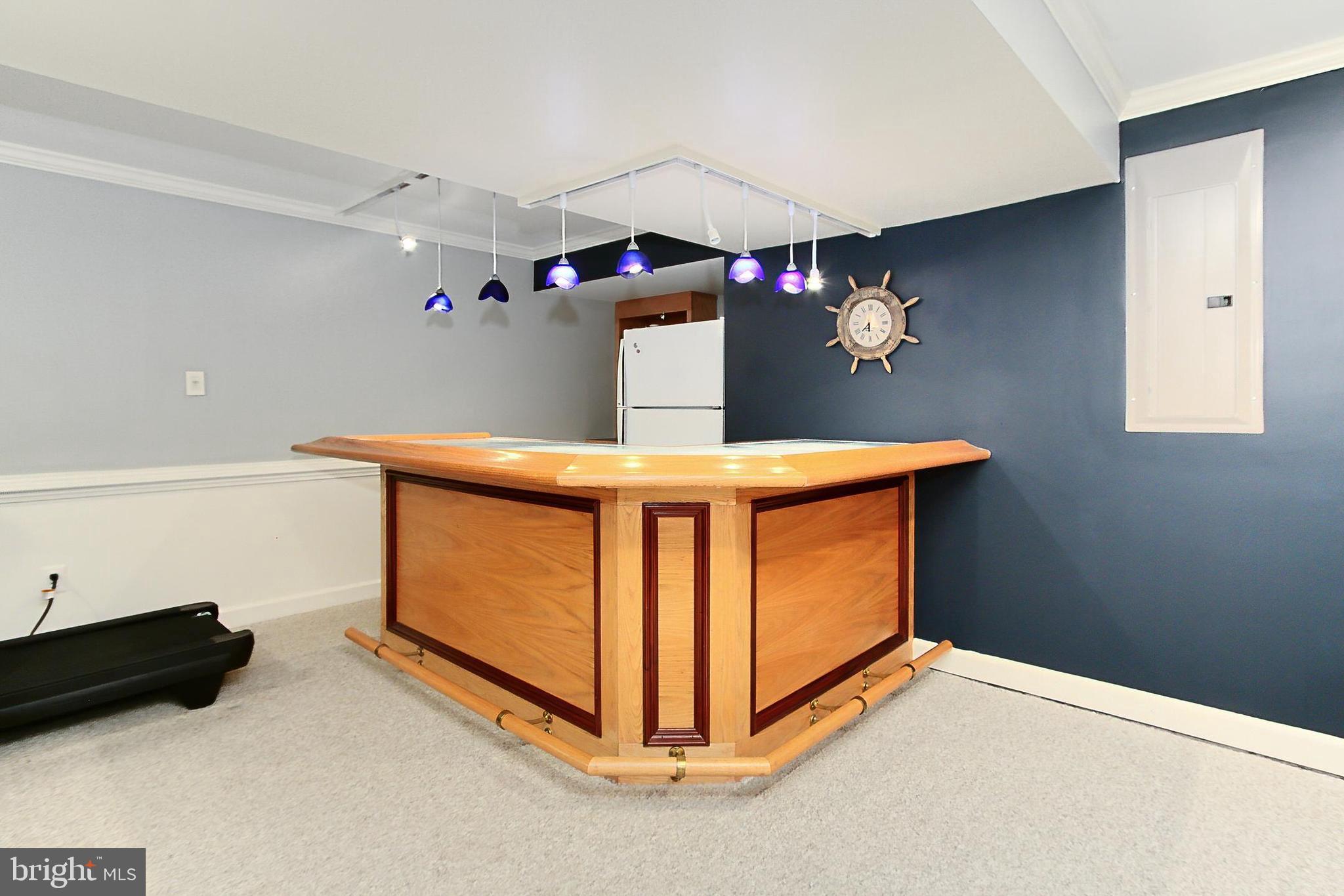 6306 Lee Forest Path Centreville, VA 20120 - Photo 34 of 49 a living room with a bed furniture and a window