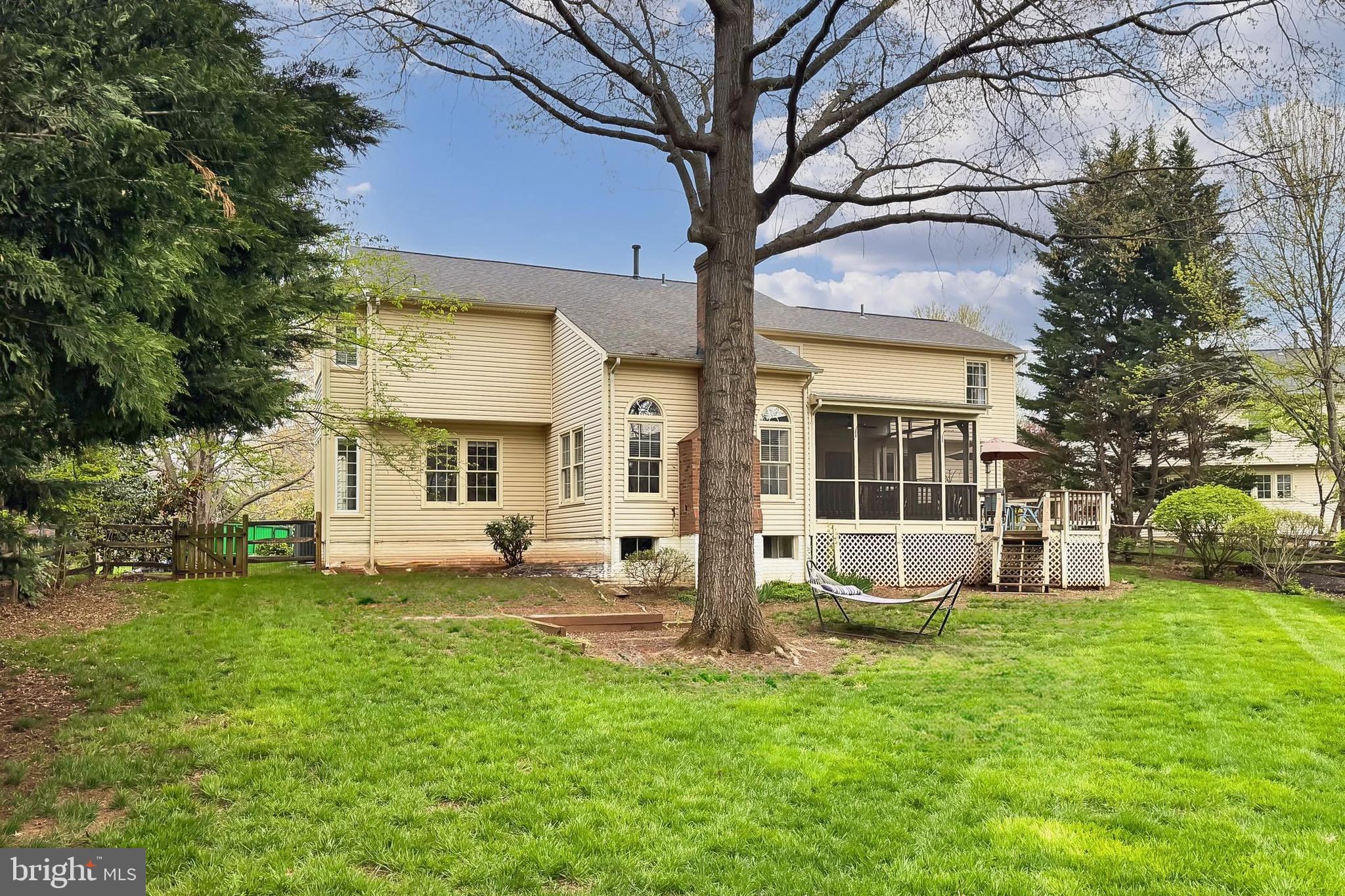 6306 Lee Forest Path Centreville, VA 20120 - Photo 45 of 49 a view of a house with a yard