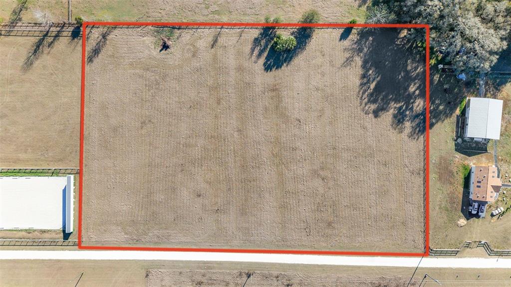 56 Northwest Court Road Reddick, FL 32686 - Photo 23 of 25 a bathroom with a shower and a shower curtain