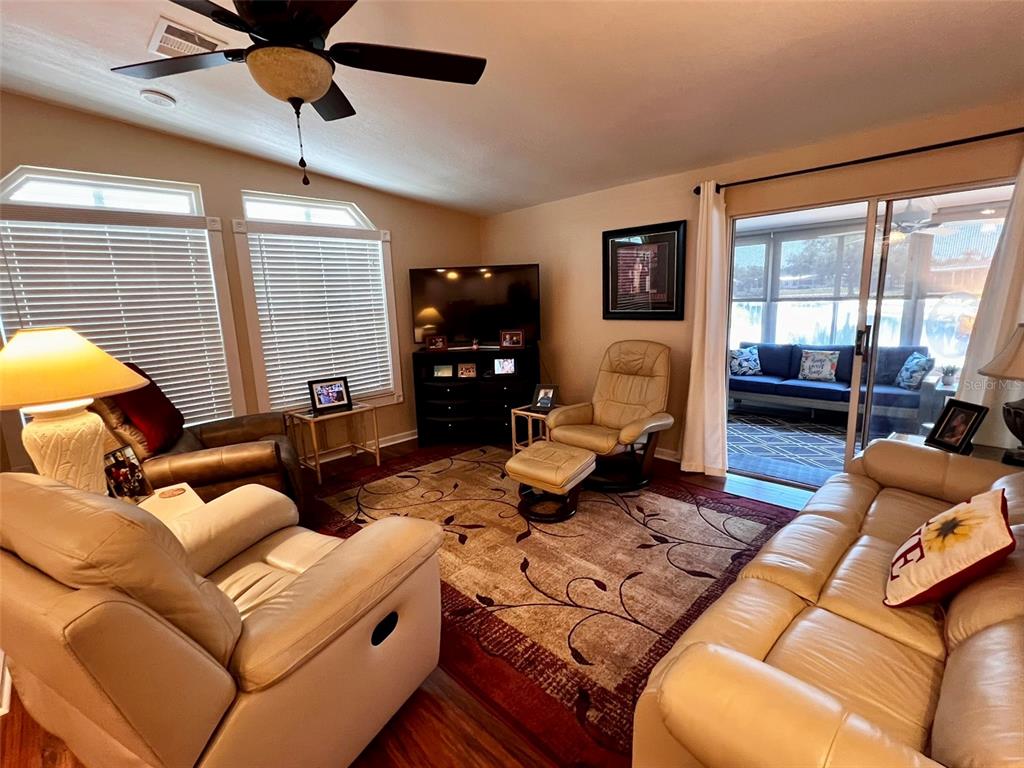 5601 Duncan Road, Unit 96 Punta Gorda, FL 33982 - Photo 20 of 30 a living room with furniture and a large window
