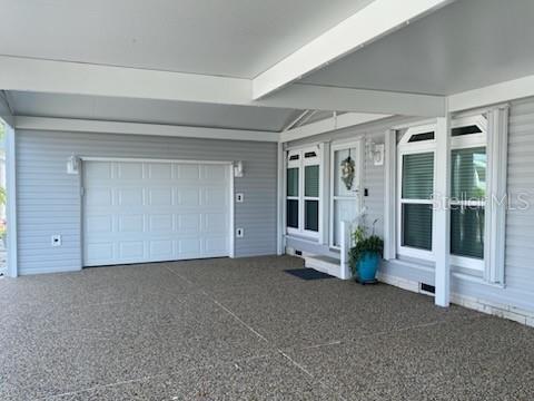 5601 Duncan Road, Unit 96 Punta Gorda, FL 33982 - Photo 25 of 30 a view of an empty room with a window and fireplace