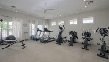 5601 Duncan Road, Unit 96 Punta Gorda, FL 33982 - Photo 29 of 30 a view of a room with gym equipment