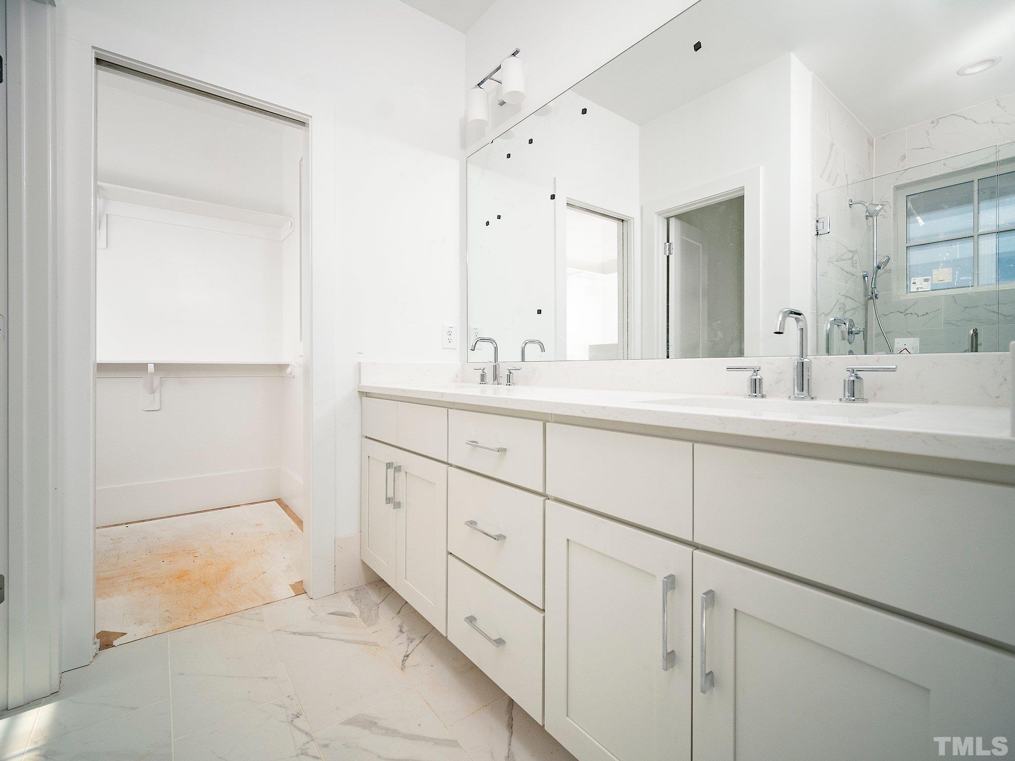 1811 Fairview Road Raleigh, NC 27608 - Photo 19 of 27 a bathroom with a sink and a mirror