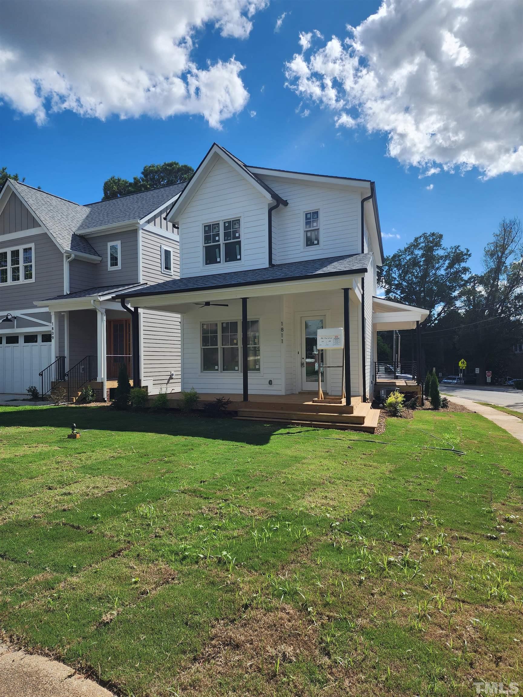1811 Fairview Road Raleigh, NC 27608 - Photo 26 of 27 a view of a house with a yard porch and sitting area