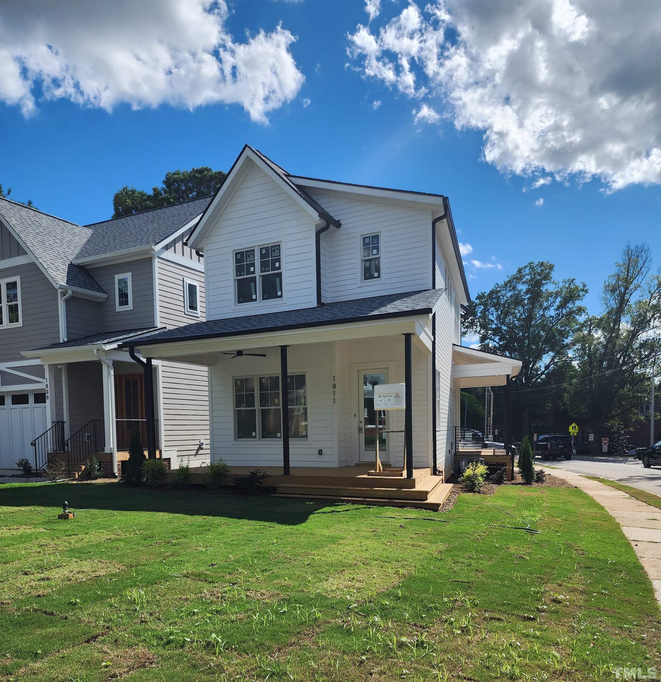 1811 Fairview Road Raleigh, NC 27608 - Photo 27 of 27 a front view of house with yard and green space