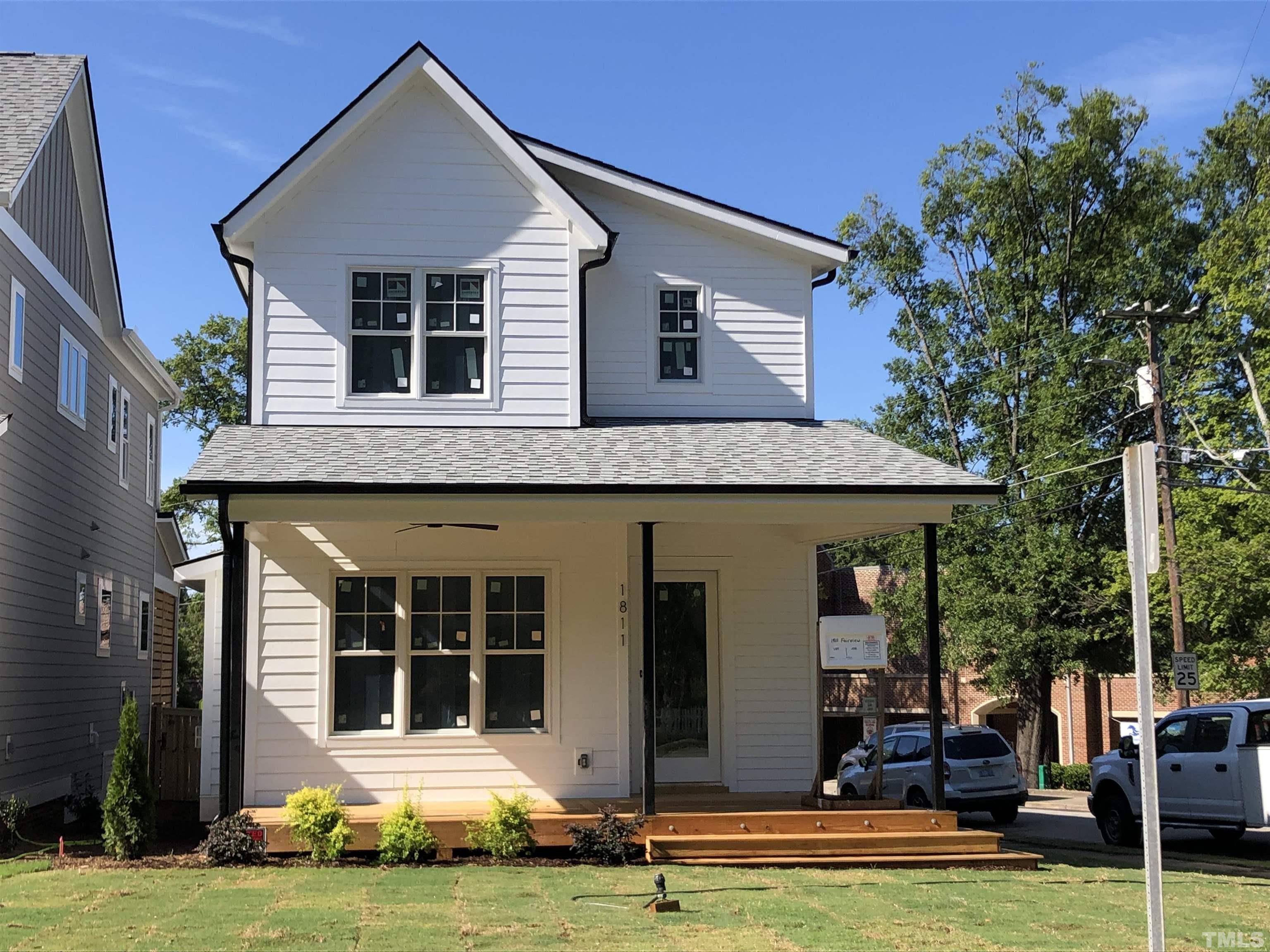 1811 Fairview Road Raleigh, NC 27608 - Photo 3 of 27 a front view of a house with garden