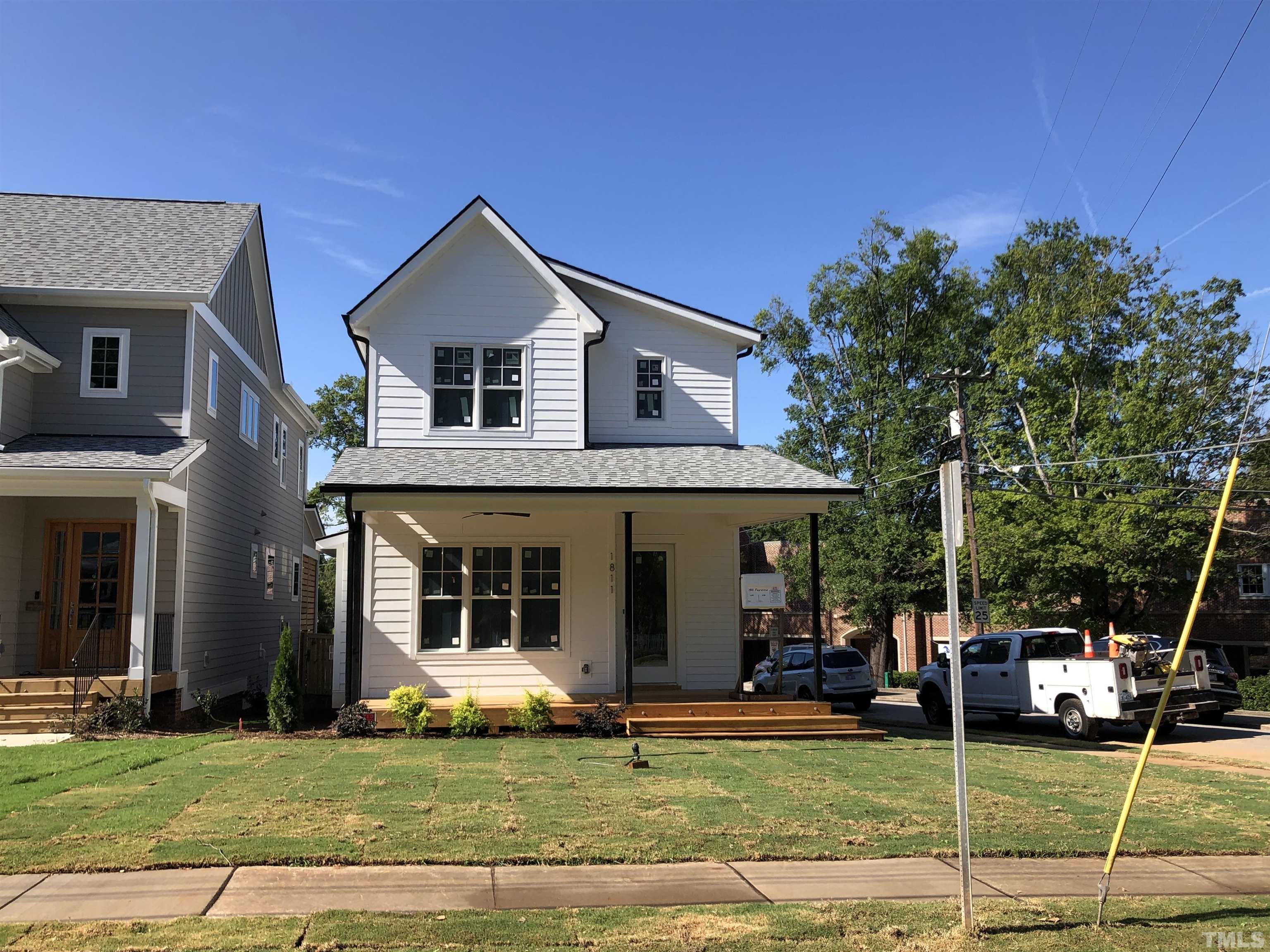 1811 Fairview Road Raleigh, NC 27608 - Photo 4 of 27 a view of a house with a yard