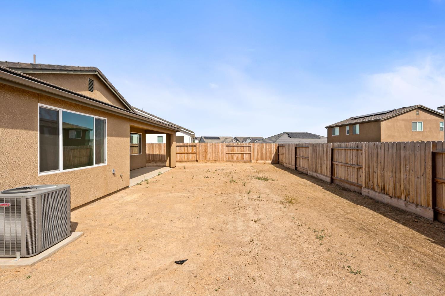 1237 Cathedral Court South Madera, CA 93636 - Photo 37 of 37 a view of a house with wooden fence