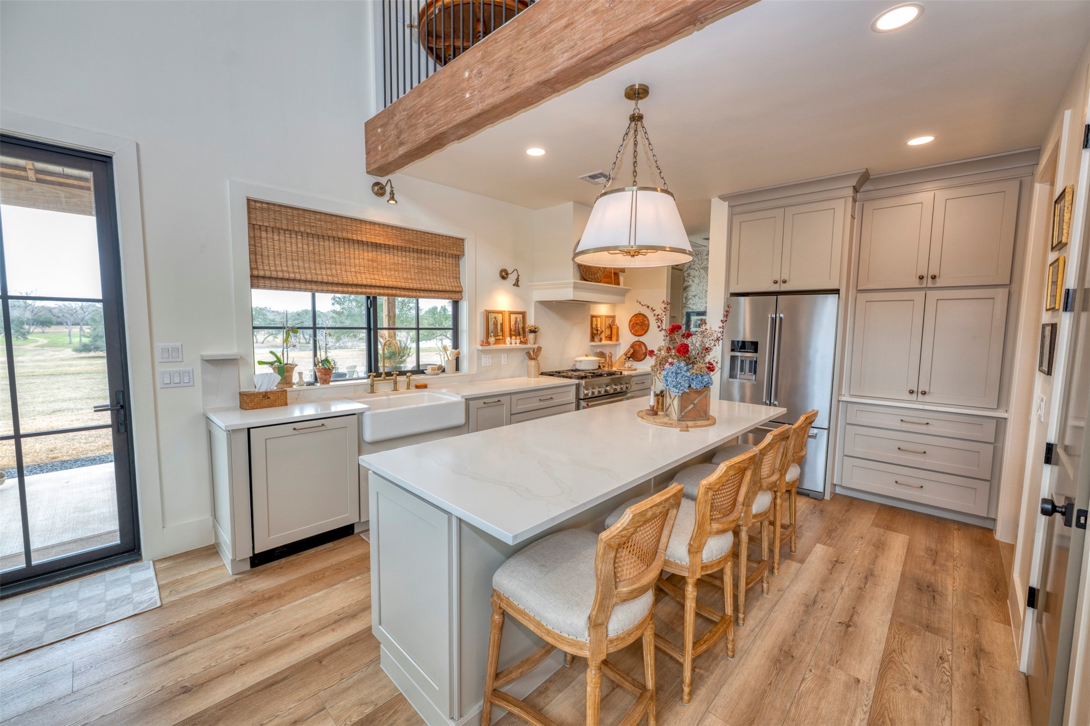 3748 Fm 1457 Round Top, TX 78954 - Photo 18 of 48 a kitchen with counter top space and wooden floor