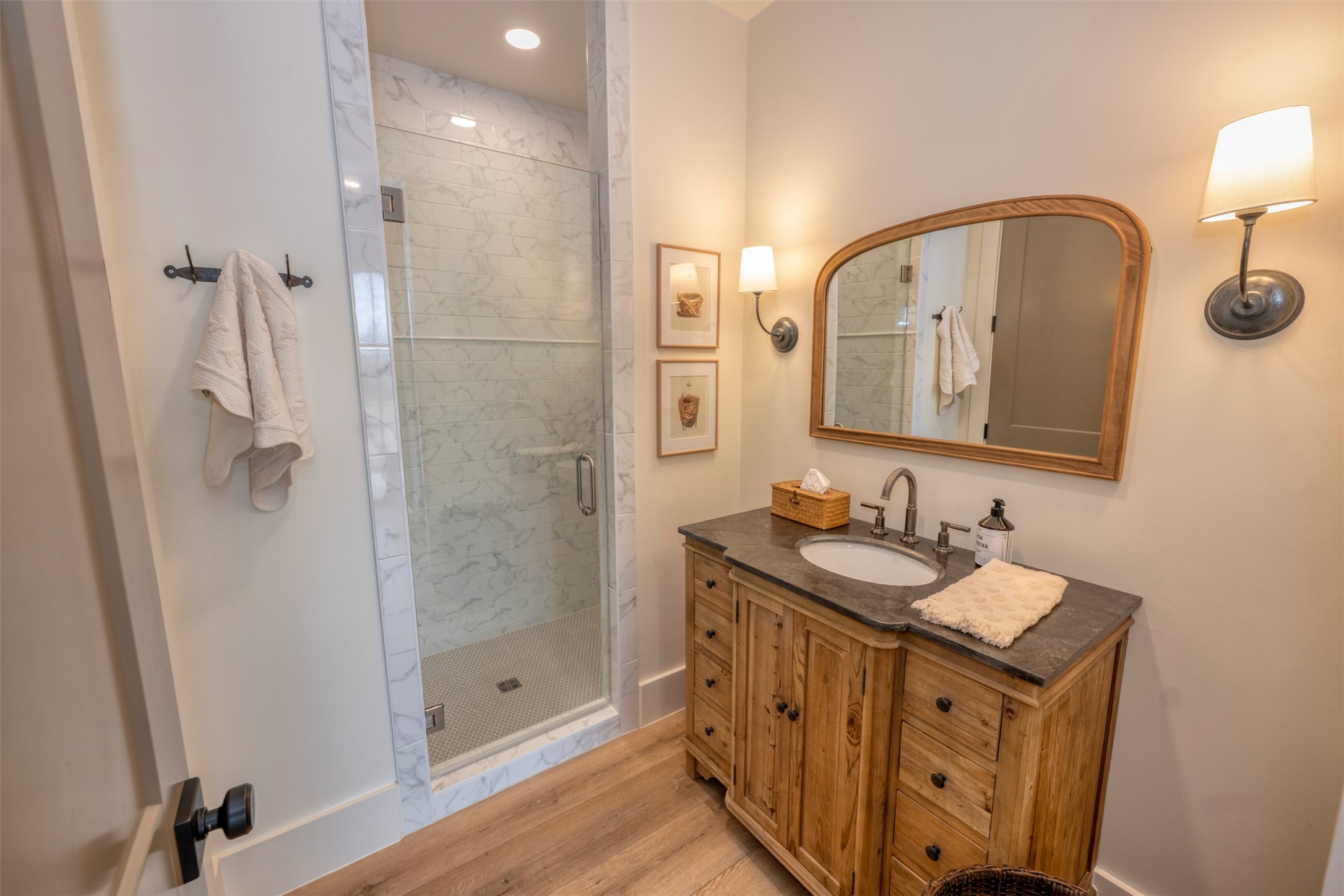 3748 Fm 1457 Round Top, TX 78954 - Photo 20 of 48 a bathroom with a sink a mirror and shower
