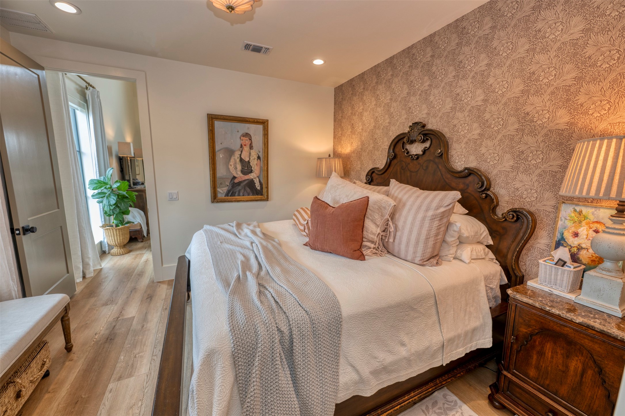 3748 Fm 1457 Round Top, TX 78954 - Photo 22 of 48 a bedroom with a bed and a potted plant
