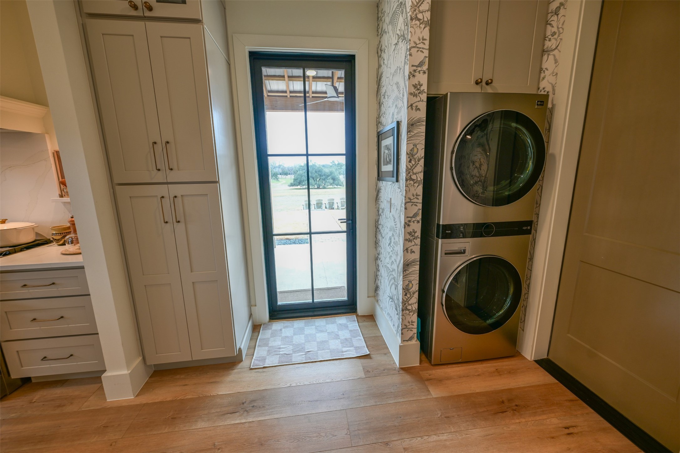 3748 Fm 1457 Round Top, TX 78954 - Photo 23 of 48 a view of a hallway with washer and dryer