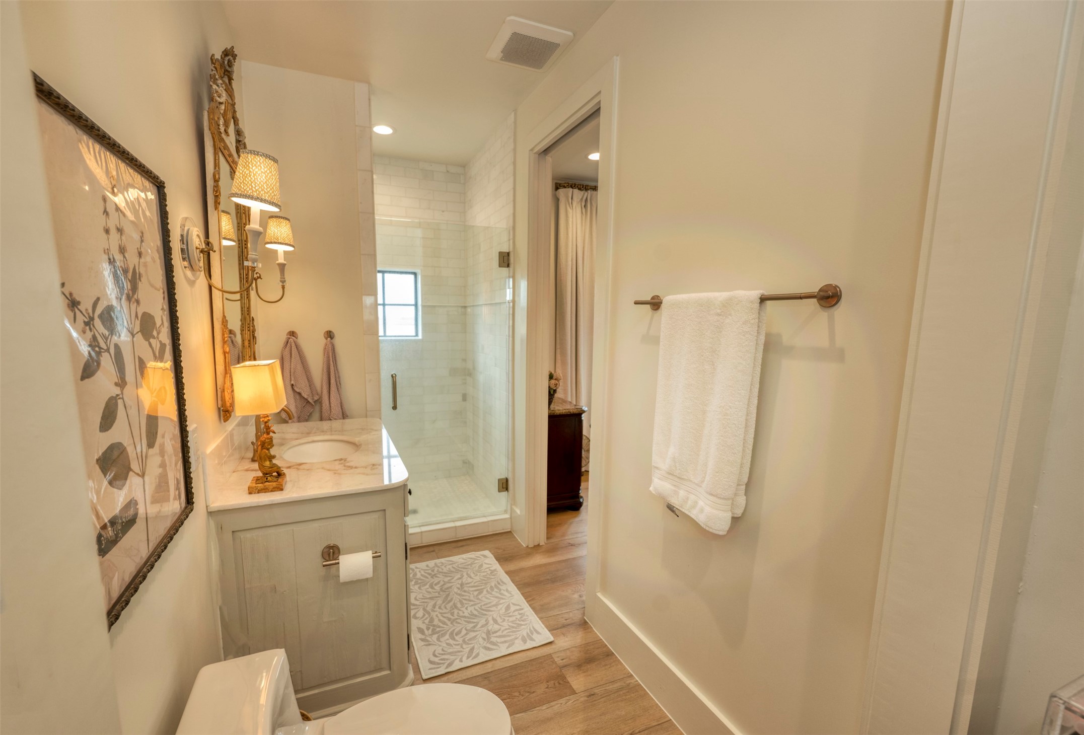 3748 Fm 1457 Round Top, TX 78954 - Photo 25 of 48 a bathroom with a granite countertop sink a mirror and a shower