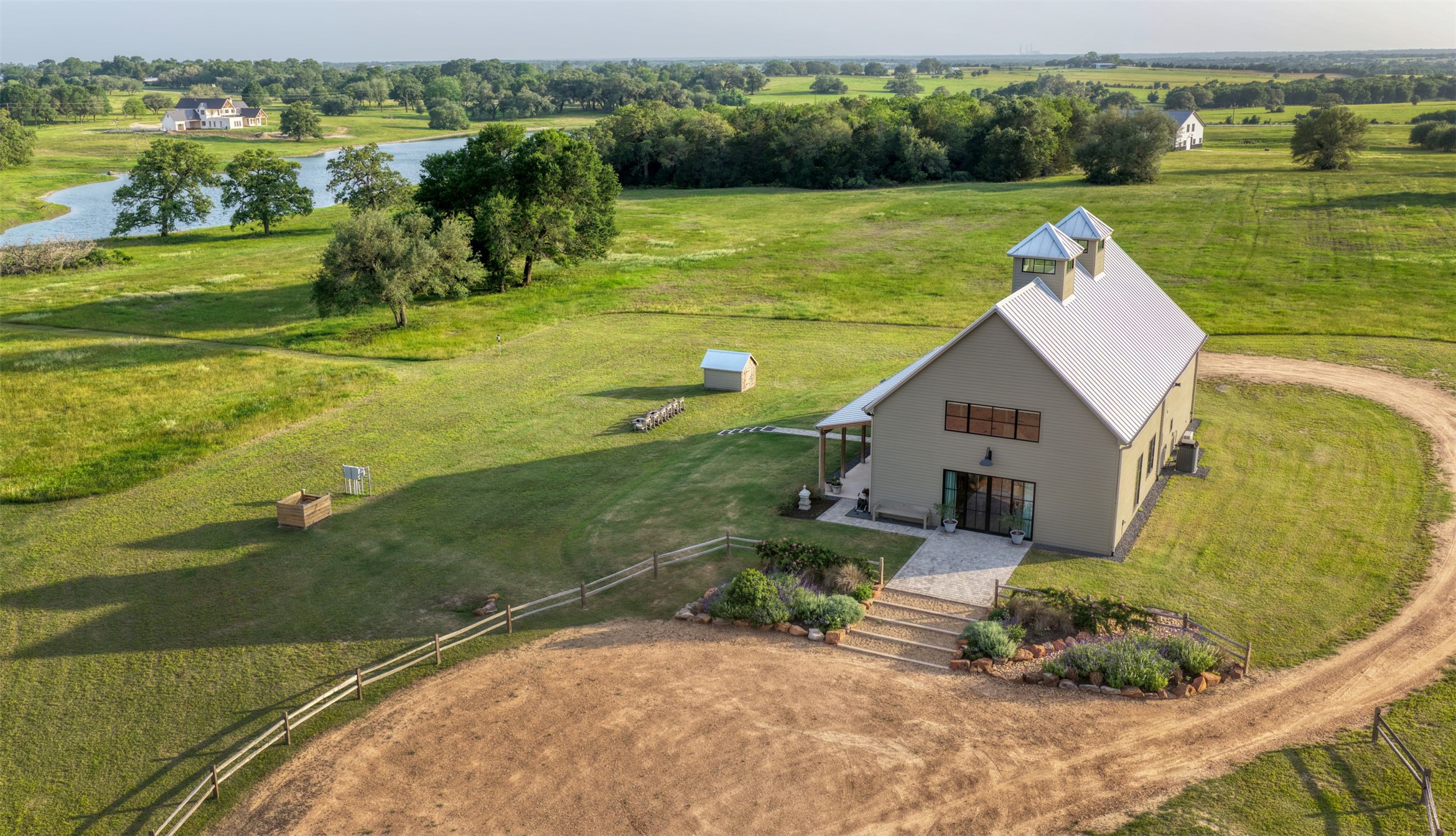 3748 Fm 1457 Round Top, TX 78954 - Photo 31 of 48 an aerial view of a house with a yard and lake view