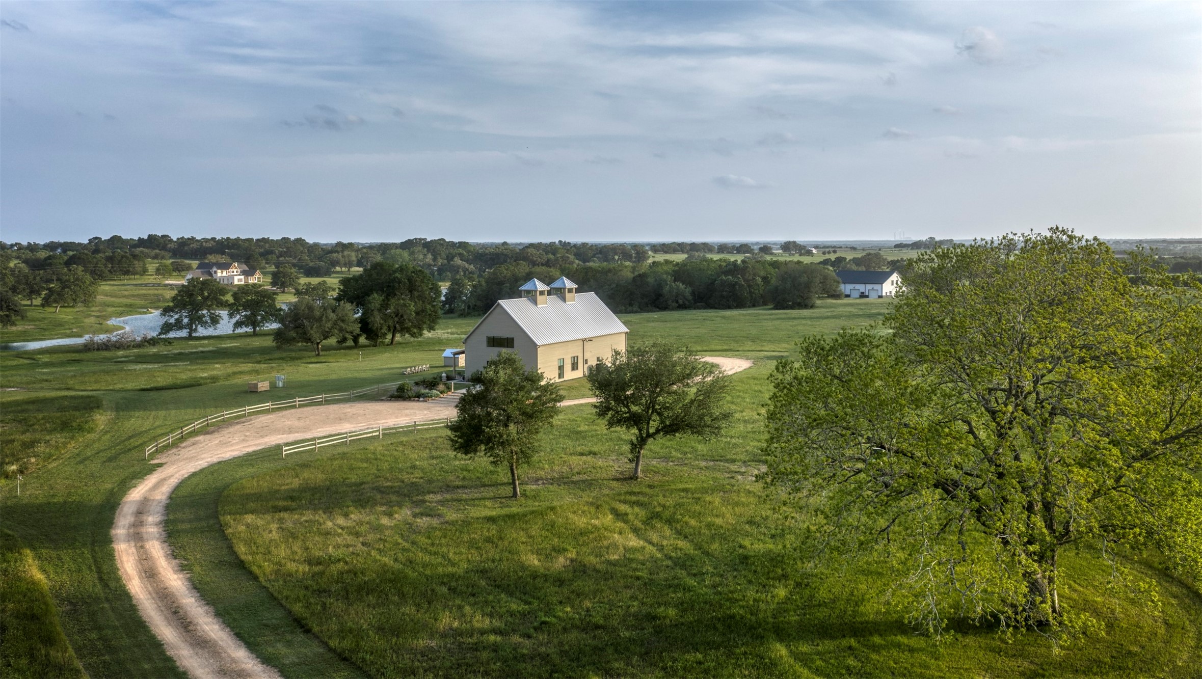 3748 Fm 1457 Round Top, TX 78954 - Photo 4 of 48 a view of a golf course with a lake