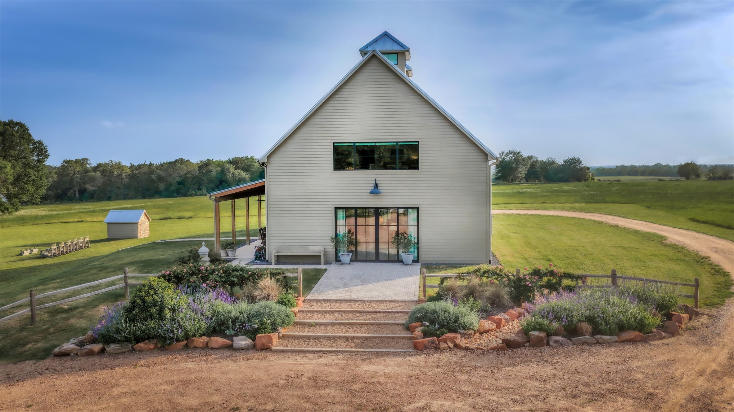 3748 Fm 1457 Round Top, TX 78954 - Photo 5 of 48 a front view of a house with a yard and ocean view