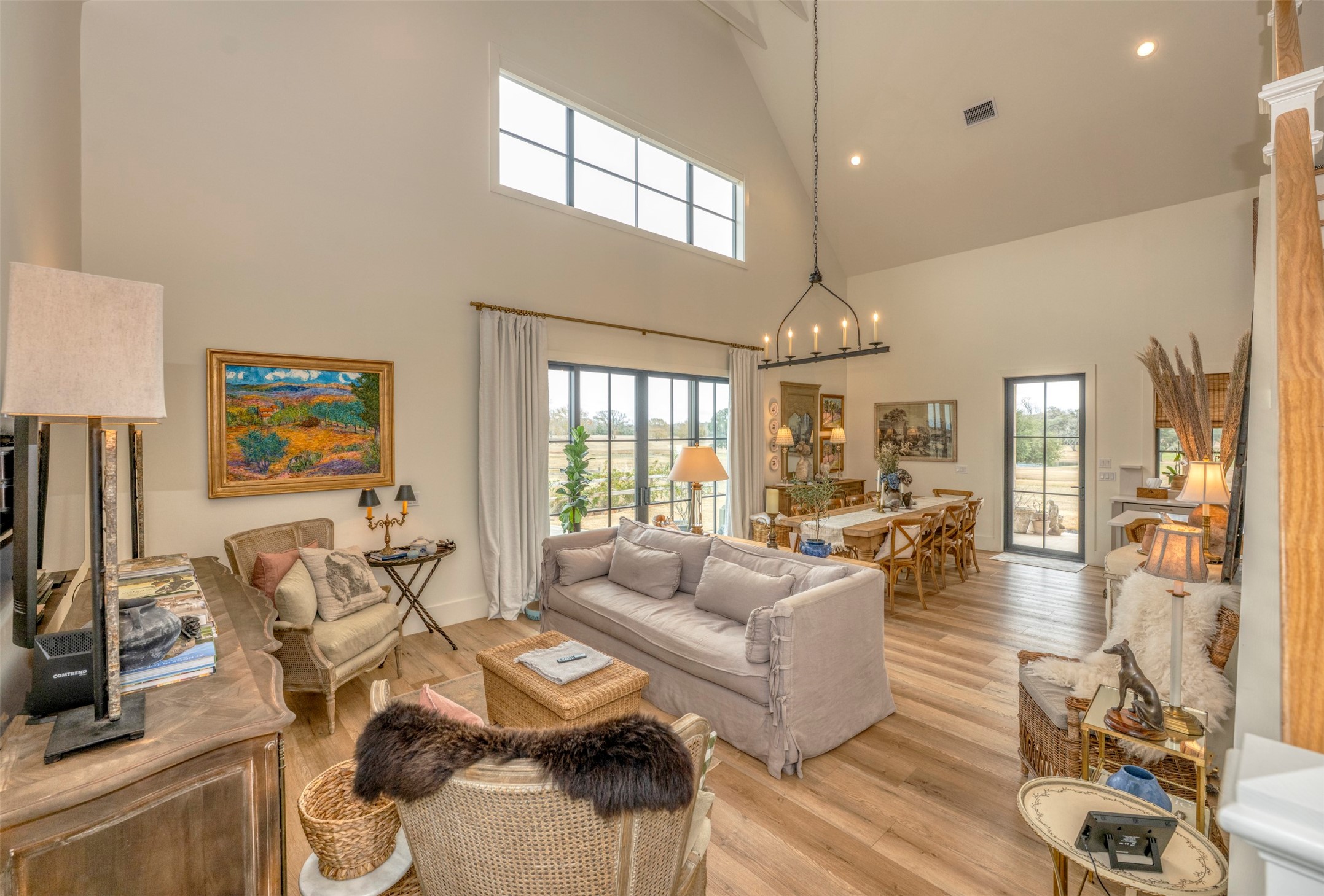 3748 Fm 1457 Round Top, TX 78954 - Photo 9 of 48 a living room with furniture a flat screen tv and a large window