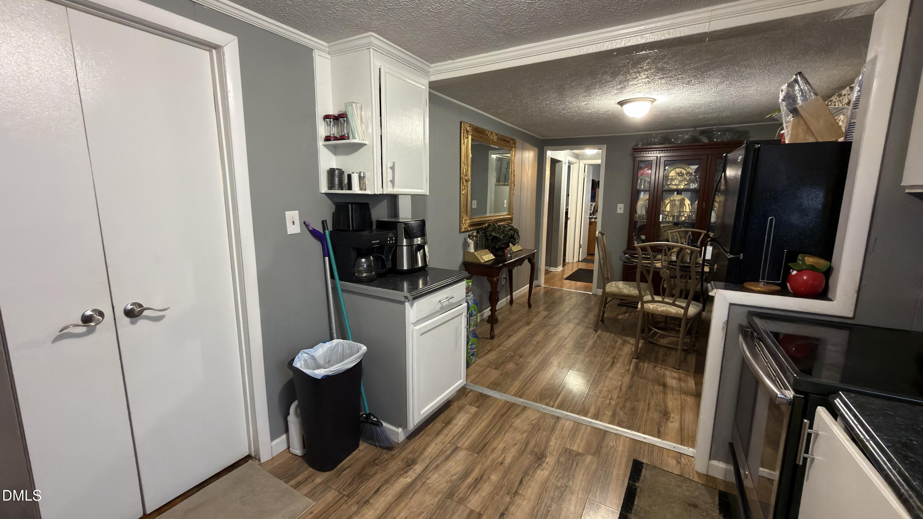 4803 Tabor Church Road Fayetteville, NC 28312 - Photo 10 of 25 a view of a hallway and a livingroom with furniture