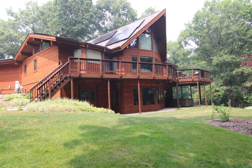 6492 Fitzgerald Road Rockford, IL 61102 - Photo 3 of 44 a view of a house with a yard