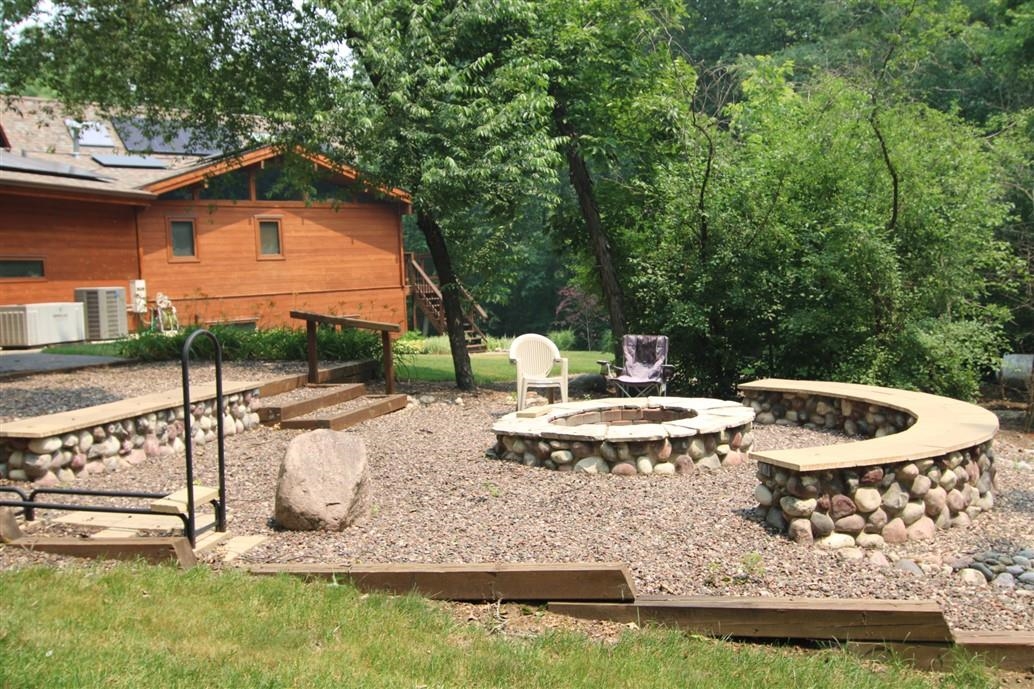 6492 Fitzgerald Road Rockford, IL 61102 - Photo 6 of 44 a view of a house with backyard sitting area and swimming pool