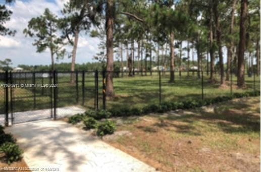 4926 Maya Street Sebring, FL 33872 - Photo 15 of 29 a view of a park with large trees