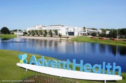 4926 Maya Street Sebring, FL 33872 - Photo 17 of 29 a view of swimming pool with a yard