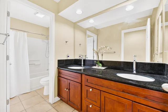 a bathroom with a toilet and a bathtub