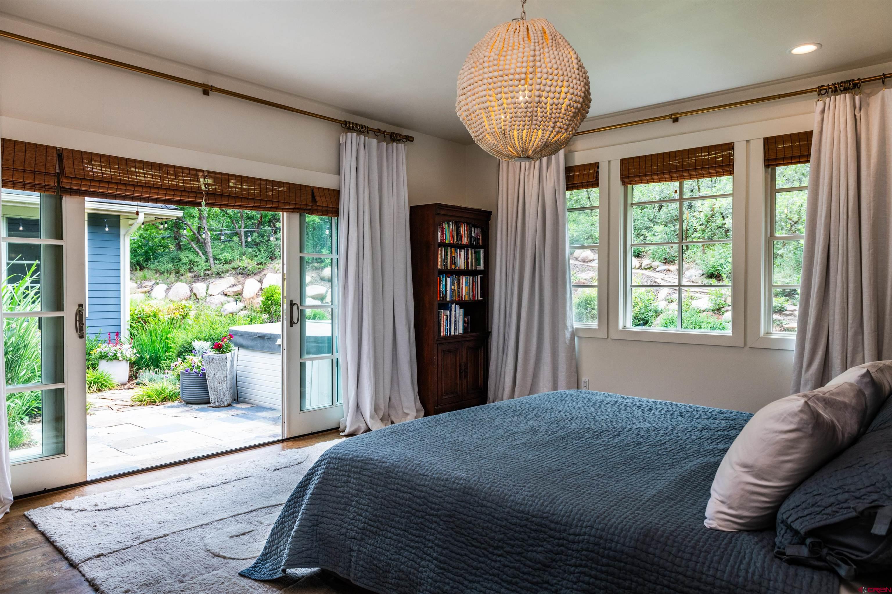 22 Kennebec Drive Durango, CO 81301 - Photo 14 of 34 a bed sitting in a bedroom next to a window